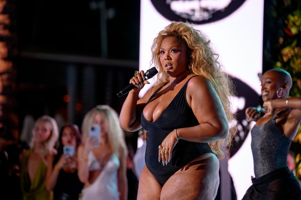 Lizzo performs during the Sports Illustrated Swimsuit Runway Show