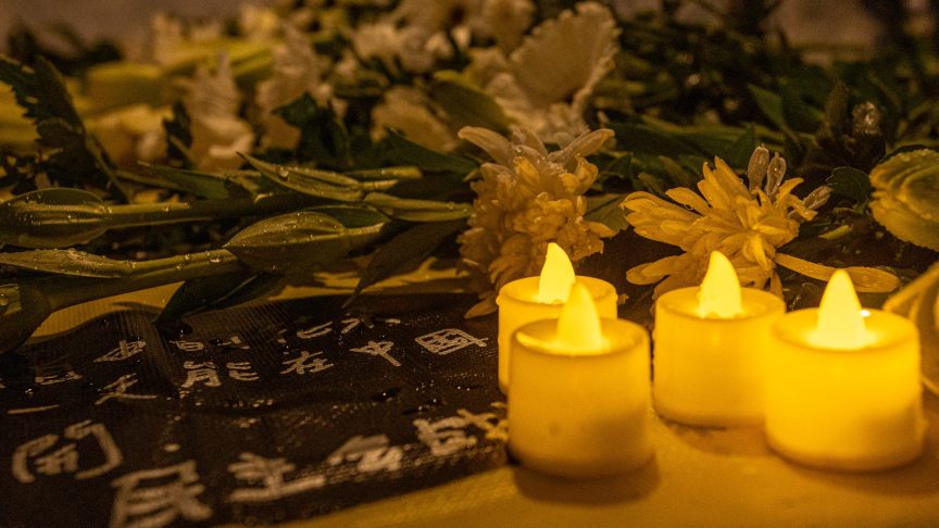 Flowers and candles for Anthony Guidera.