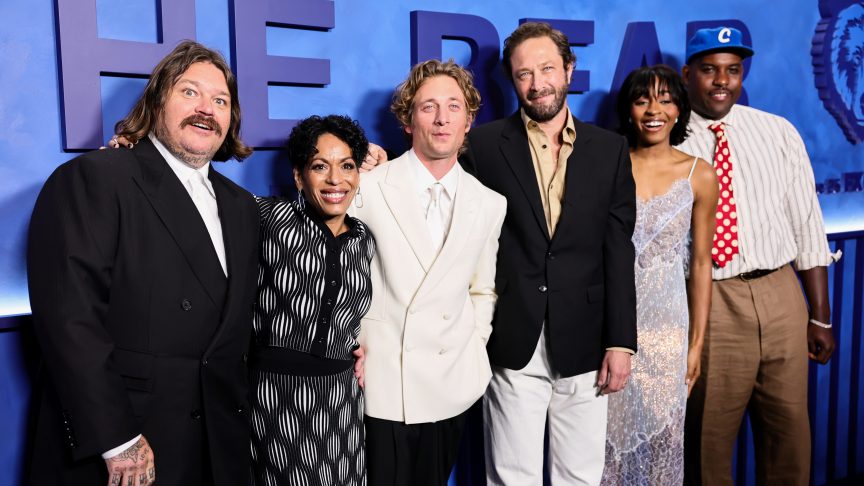 The main ensemble cast of FX’s The Bear laughing and posing together on the red carpet at the final season celebration.