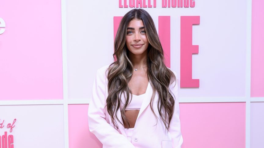 Gia Giudice poses on the pink carpet at the "Elle" Season 1 world premiere in New York City.