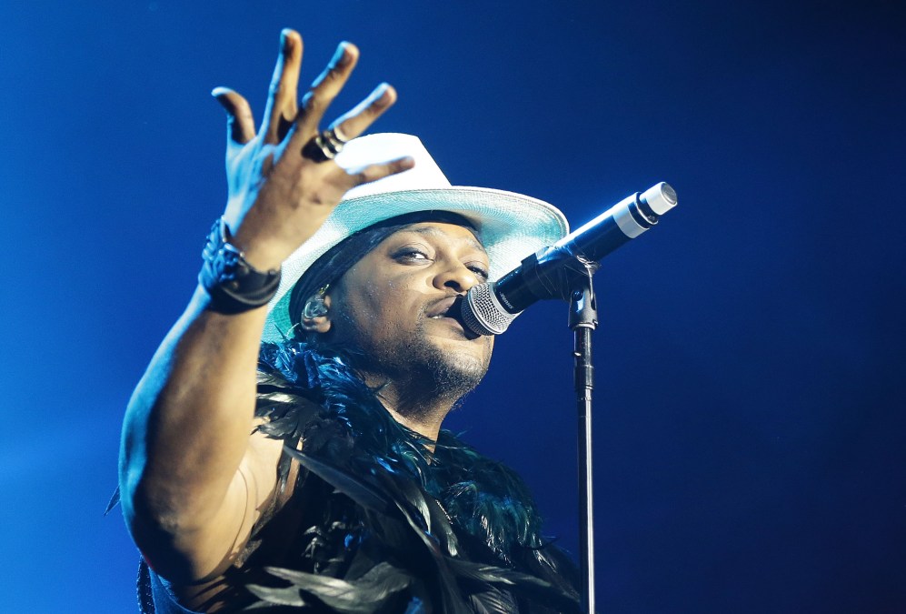 D'Angelo performing onstage in 2016