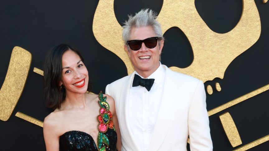 Johnny Knoxville and wife Emily Ting pose on the red carpet