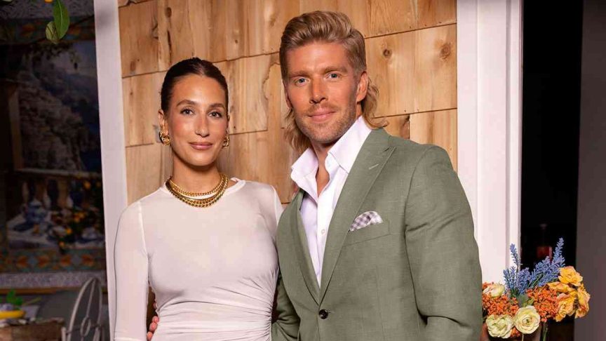 Kyle Cooke and Amanda Batula pose together at a previous "Summer House" reunion event.