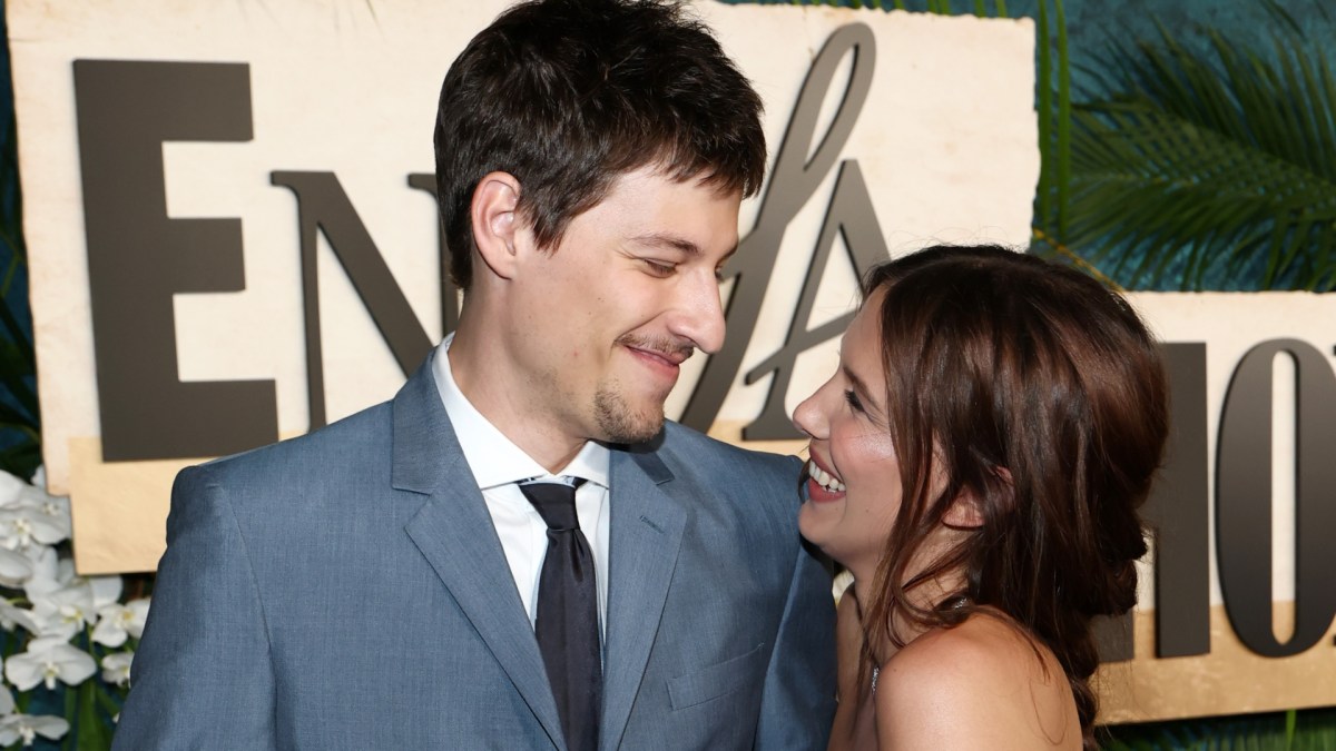 Millie Bobby Brown and Jake Bongiovi smile at Enola Holmes 3 premiere