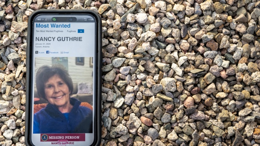 photo of Nancy Guthrie on a phone
