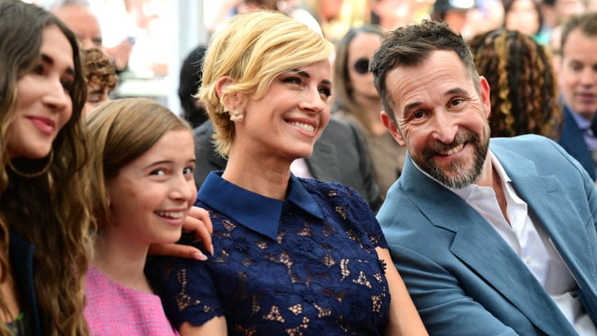 Noah Wyle attends an event with his wife and two daughters