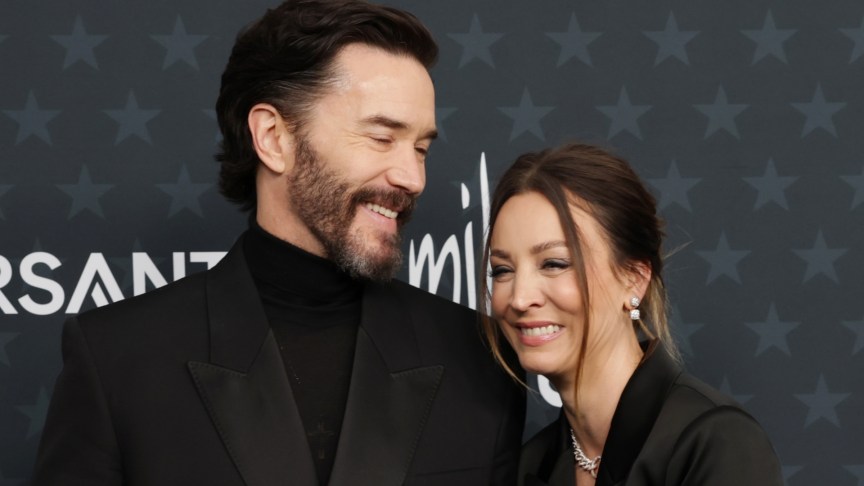 Tom Pelphrey and Kaley Cuoco attend an event
