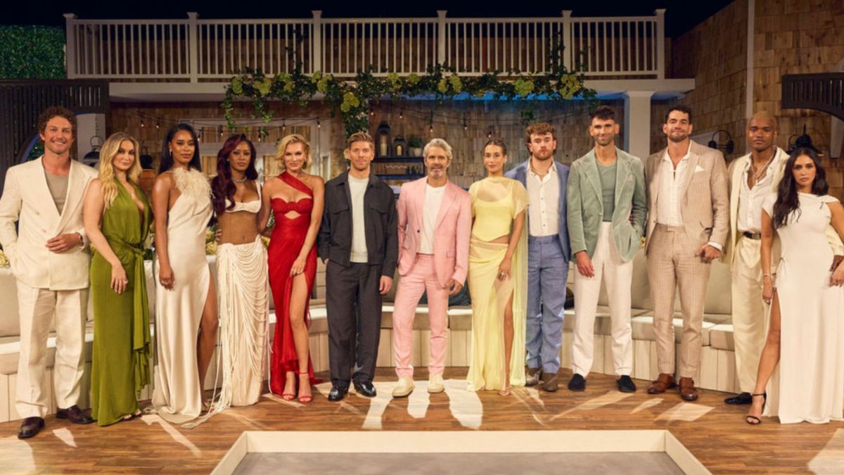 Andy Cohen poses with the "Summer House" cast