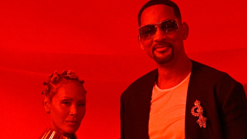 Will Smith and Jada Pinkett Smith pose for ohotos