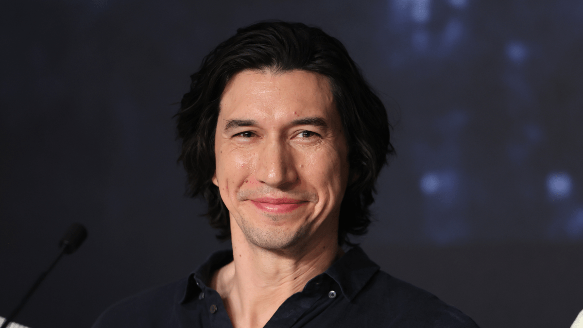 Adam Driver smiling.