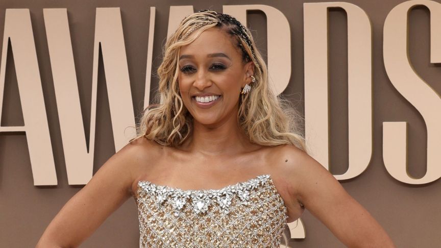 Tia Mowry smiling on the BET Awards red carpet