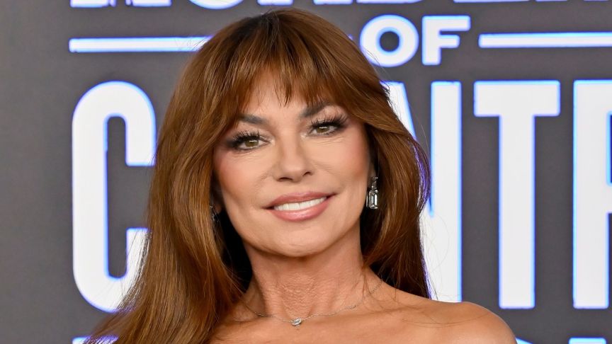 Shania Twain smiling on the red carpet