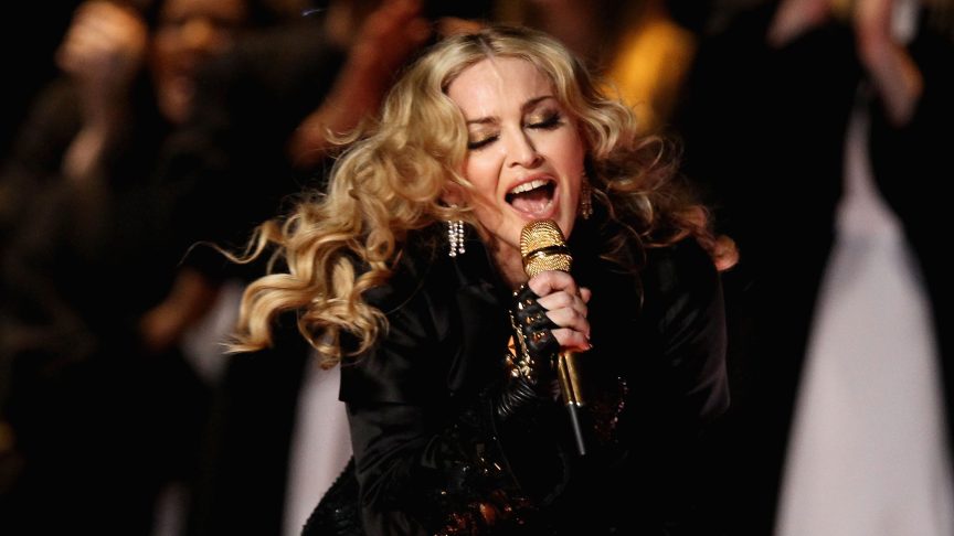 Singer Madonna performs during the Bridgestone Super Bowl XLVI Halftime Show at Lucas Oil Stadium.