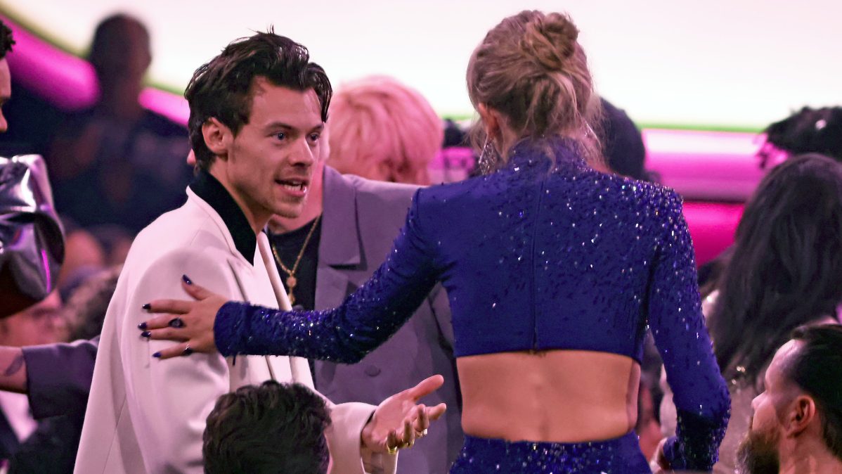 Harry Styles and Taylor Swift speak during the 65th GRAMMY Awards at Crypto.com Arena.