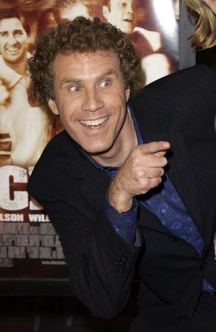 Will Ferrell grins and points in black jacket
