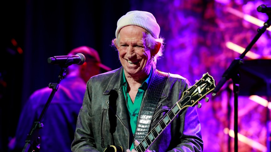 Keith Richards performing onstage