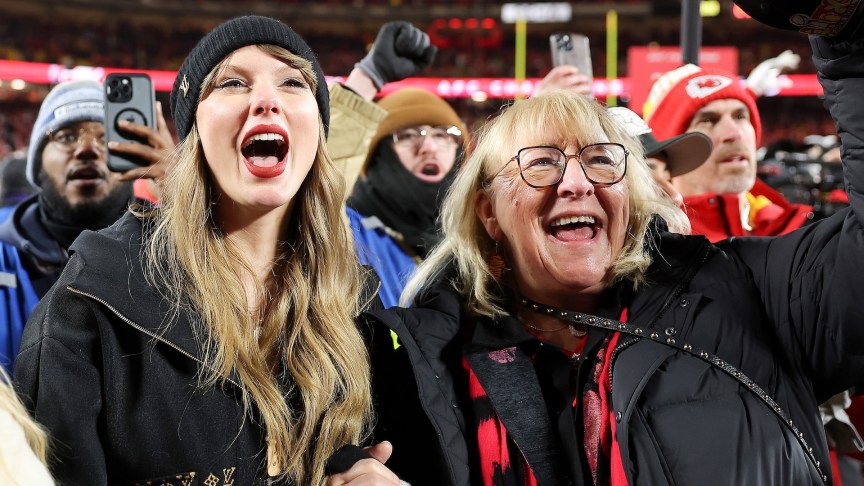 Taylor Swift and Donna Kelce cheering on Travis Kelce during a Kansas City Chiefs game.