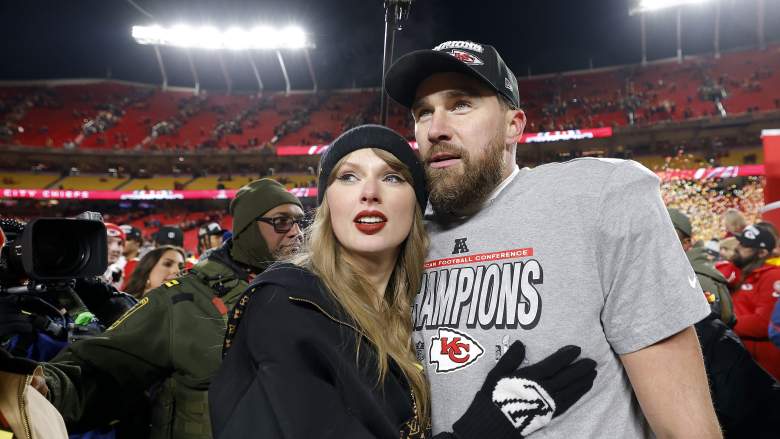 Taylor Swift celebrates with Travis Kelce #87 of the Kansas City Chiefs after defeating the Buffalo Bills 32-29 in the AFC Championship Game at GEHA Field at Arrowhead Stadium.