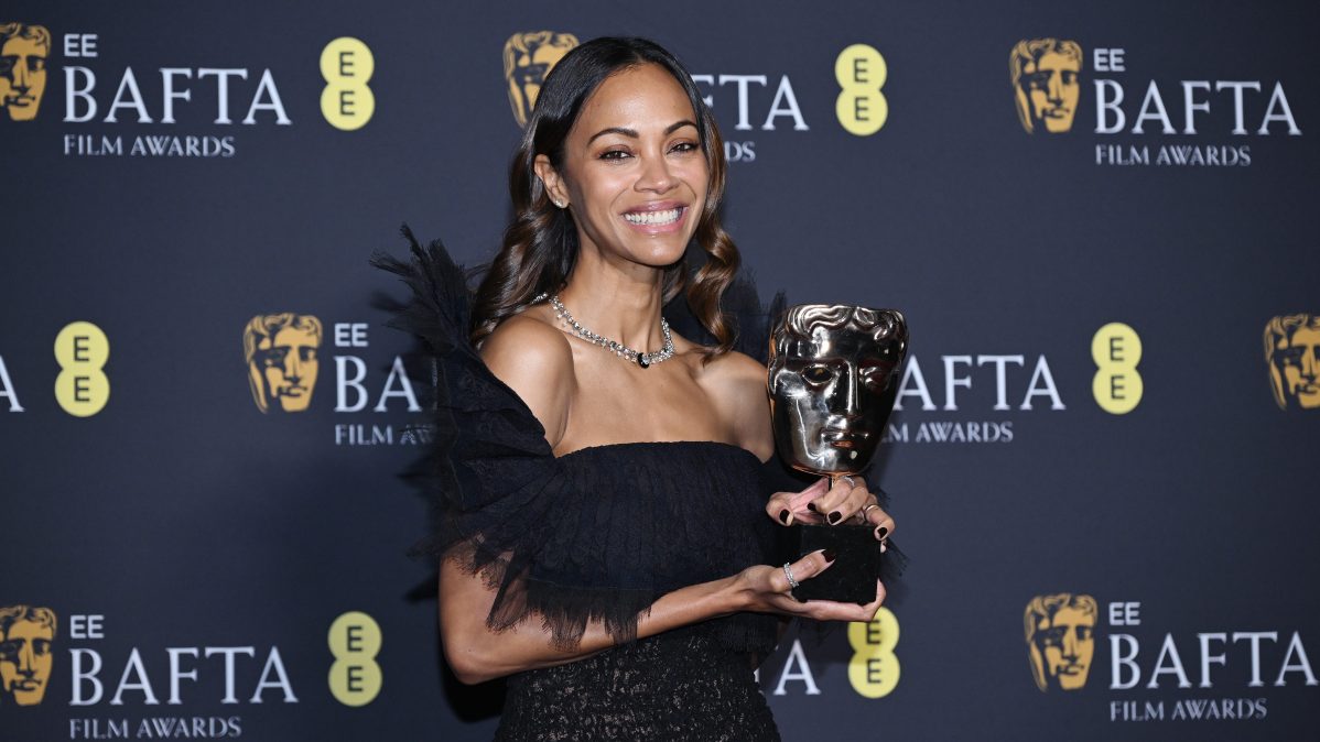 Zoe Saldana poses with Supporting Actress Award for 'Emilia Pérez' during the EE BAFTA Film Awards 2025 at The Royal Festival Hall in London, England.