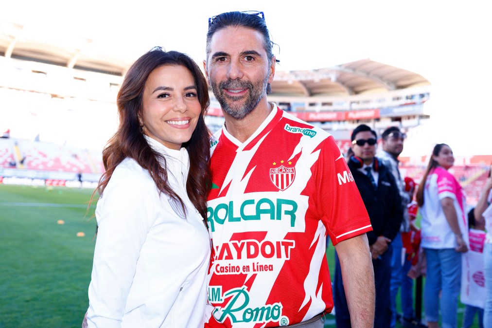 AGUASCALIENTES, MEXICO - MARCH 28: Eva Longoria shareholder of the Necaxa club and her husband Jose Antonio Pepe Baston Patino poses for a photo prior the 13th round match between Necaxa and Queretaro as part of the Torneo Clausura 2025 Liga MX at Victoria Stadium on March 28, 2025 in Aguascalientes, Mexico. (Photo by Leopoldo Smith/Getty Images)