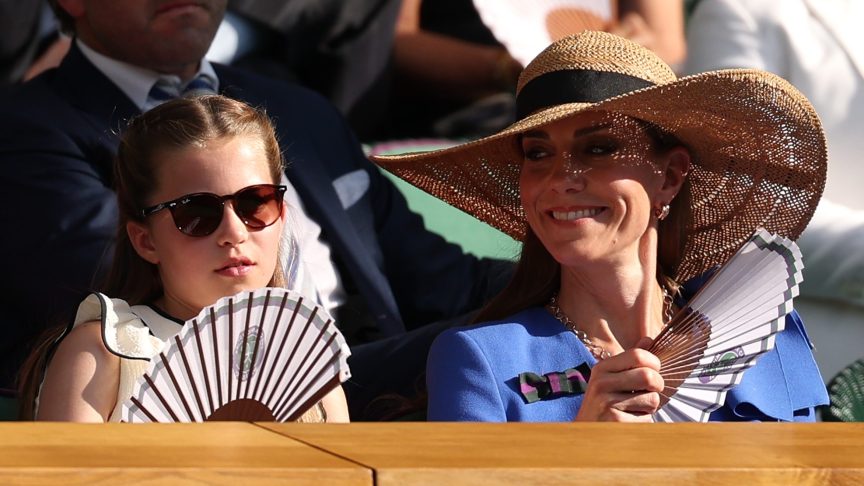 LONDON, ENGLAND - JULY 13: Princess Charlotte of Wales and Catherine, Princess of Wales, Patron of The AELTC fan themselves in the Royal Box during the Gentleman's Singles Final between Jannik Sinner of Italy and Carlos Alcaraz of Spain on day fourteen of The Championships Wimbledon 2025 at All England Lawn Tennis and Croquet Club on July 13, 2025 in London, England. (Photo by Julian Finney/Getty Images)