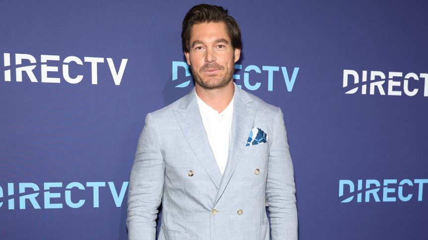 Craig Conover poses on the blue carpet at the DIRECTV Plot Twist Featuring Bravo event in New York City.