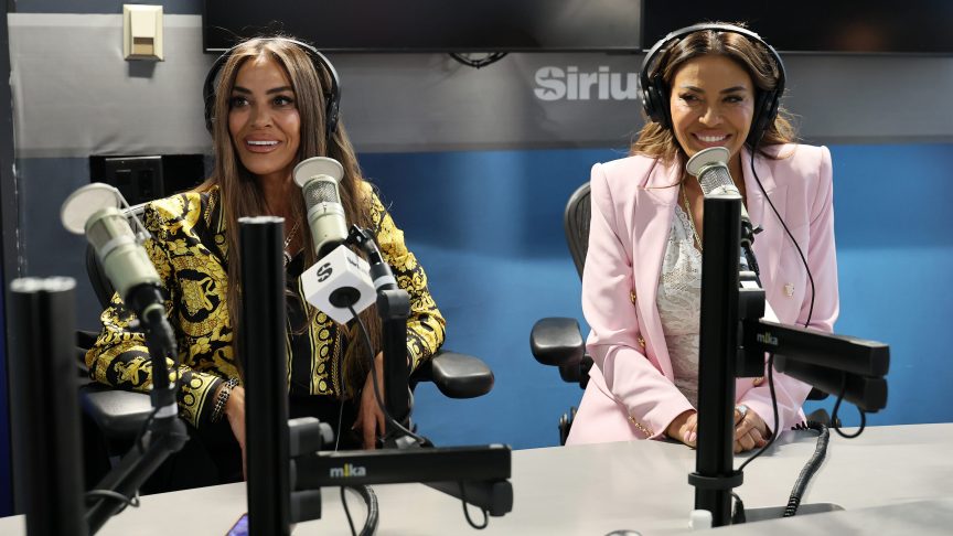 Dolores Catania and Liz McGraw smiling during a SiriusXM studio appearance in New York City.
