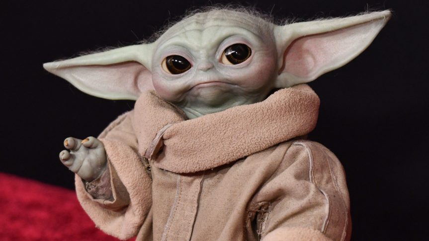 Grogu waving on the Red Carpet at the world premiere of "Star Wars: The Mandalorian and Grogu"