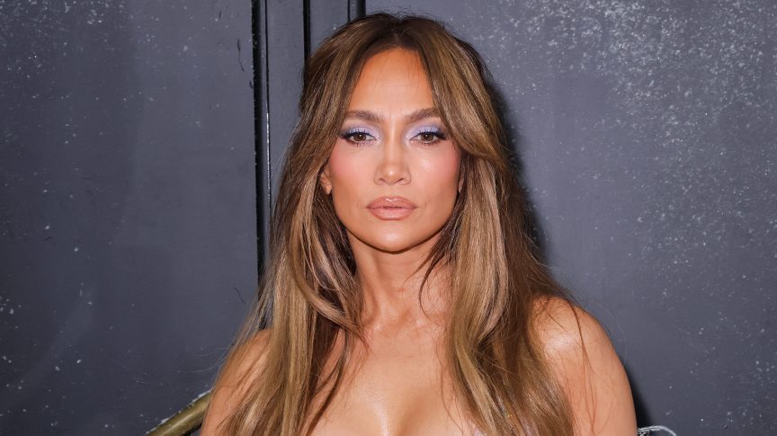 Jennifer Lopez poses backstage during Paris Haute Couture Fashion Week in July 2026.