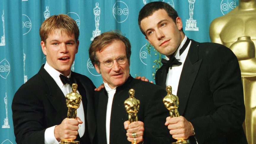 Matt Damon and Ben Affleck receive Academy Awards alongside Robin Williams for their film, "Good Will Hunting."