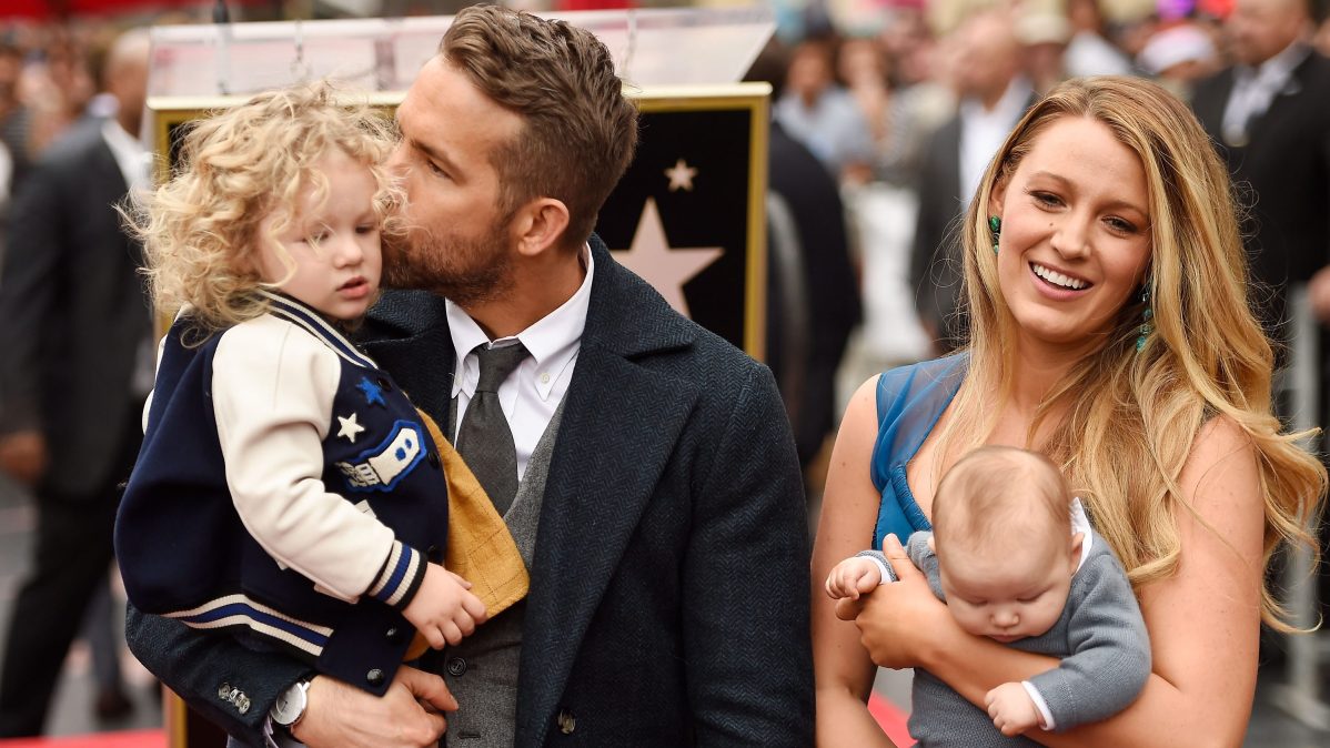 Actors Ryan Reynolds and Blake Lively pose with their daughters as Ryan Reynolds is honored with a star on the Hollywood Walk of Fame.