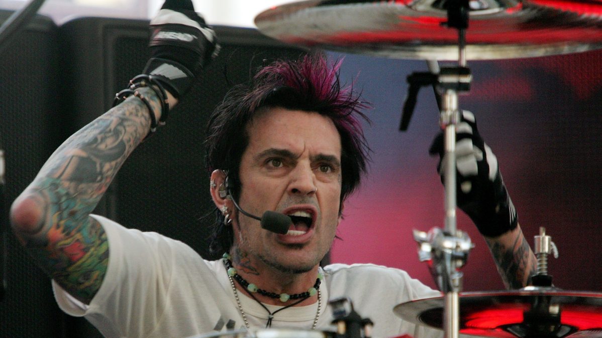 Tommy Lee, drummer of Rock Star: Supernova, performs during a rehearsal for the CD USA New Year's Eve event at the Fremont Street Experience.