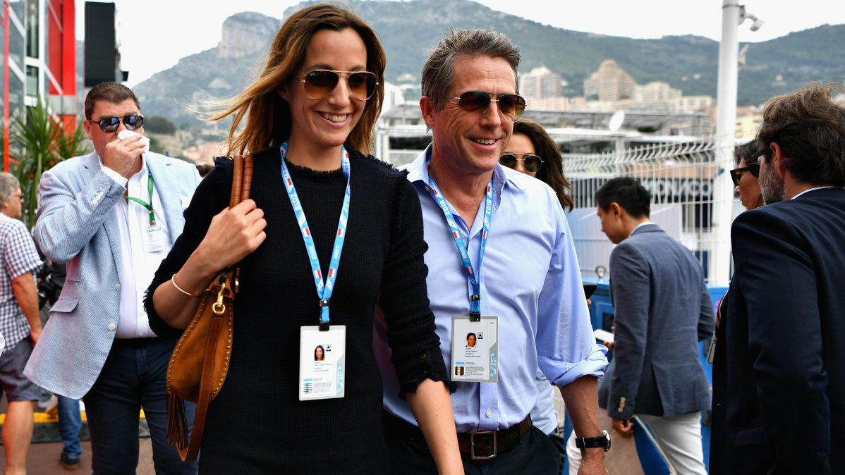 Actor Hugh Grant and his wife, TV producer Anna Eberstein walk in the Paddock before the Monaco Formula One Grand Prix at Circuit de Monaco.