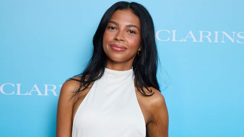 Layla Taylor poses in a white dress.