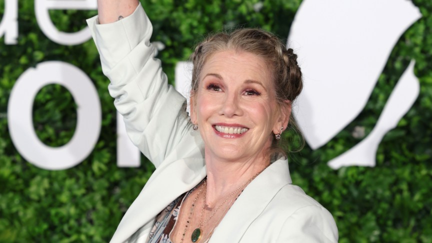Melissa Gilbert smiling and waving at an event