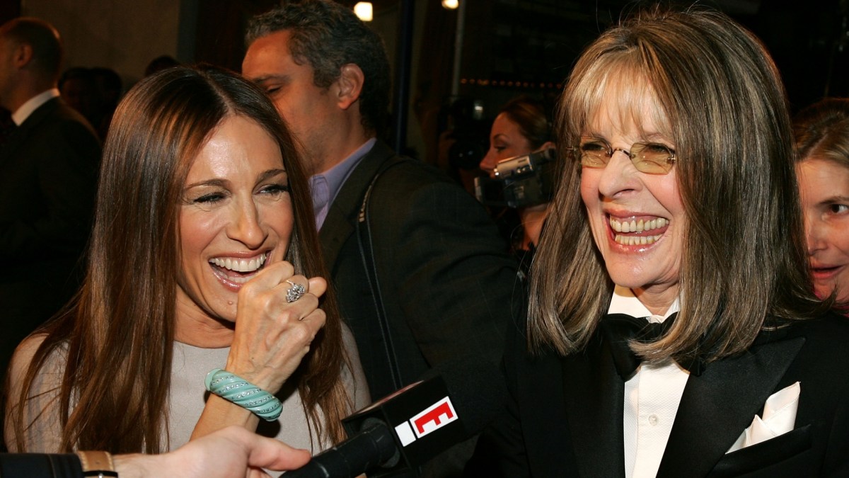 Sarah Jessica Parker and Diane Keaton laugh during an interview.