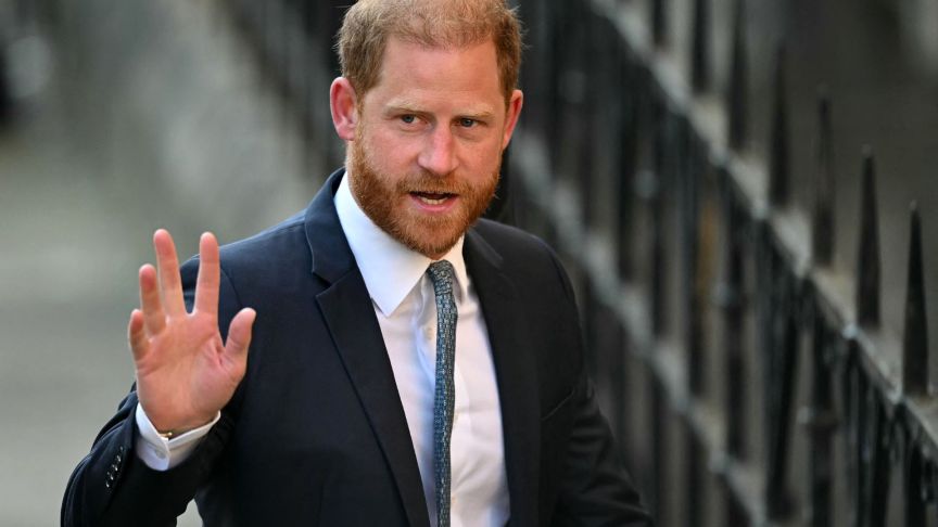 Britain's Prince Harry, Duke of Sussex waves as he arrives at the the Royal Courts of Justice, Britain's High Court, in central London.