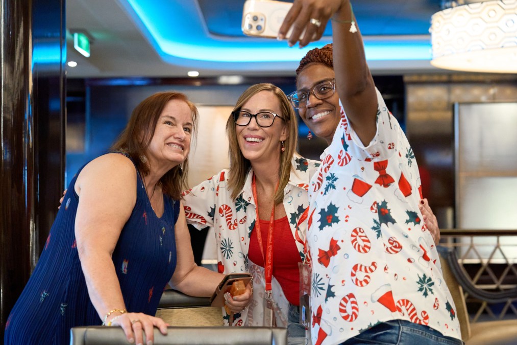 Tyler Hynes' mom, Betty, poses for a selfie with fans Jessica and Helena aboard the Hallmark Christmas Cruise