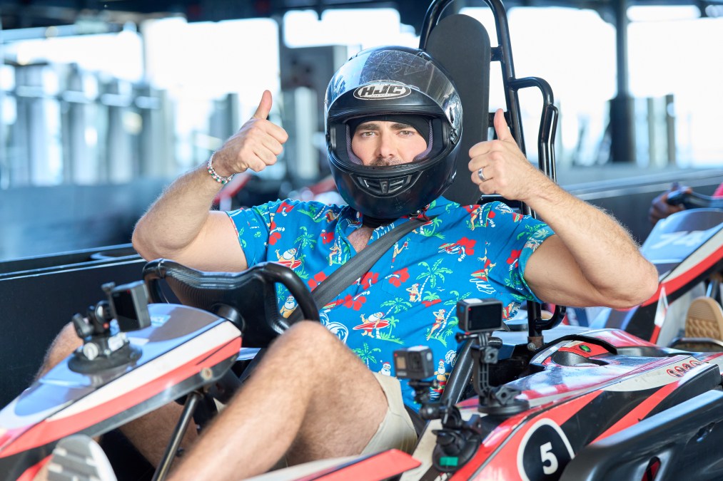 Jonathan Bennett gives thumbs up in go-kart