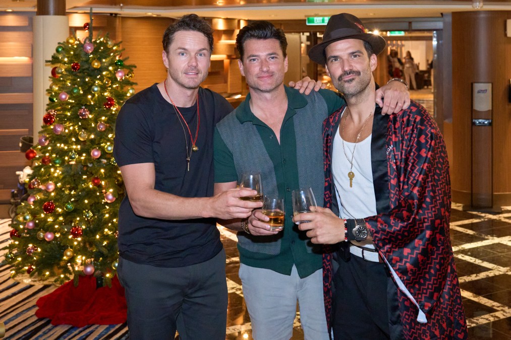 Paul Campbell, Wes Brown, and Benjamin Ayres pose together