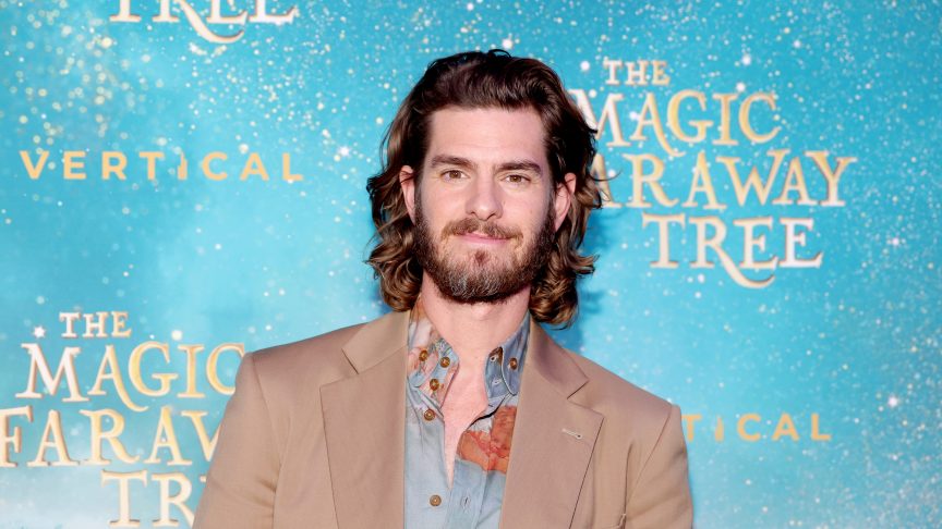 Andrew Garfield revealed his favorite hairstyle to accommodate his longer locks these days as he films "The Magic Faraway Tree" with Claire Foy.
