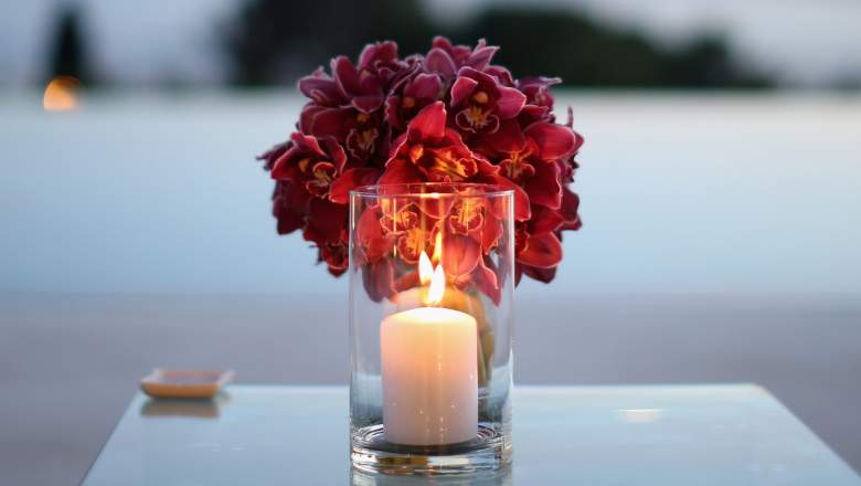 Flowers and a candle for Joan Blackman.