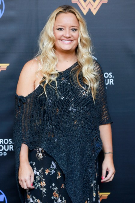 Lucy Davis rocks a black see-through outfit for an event.