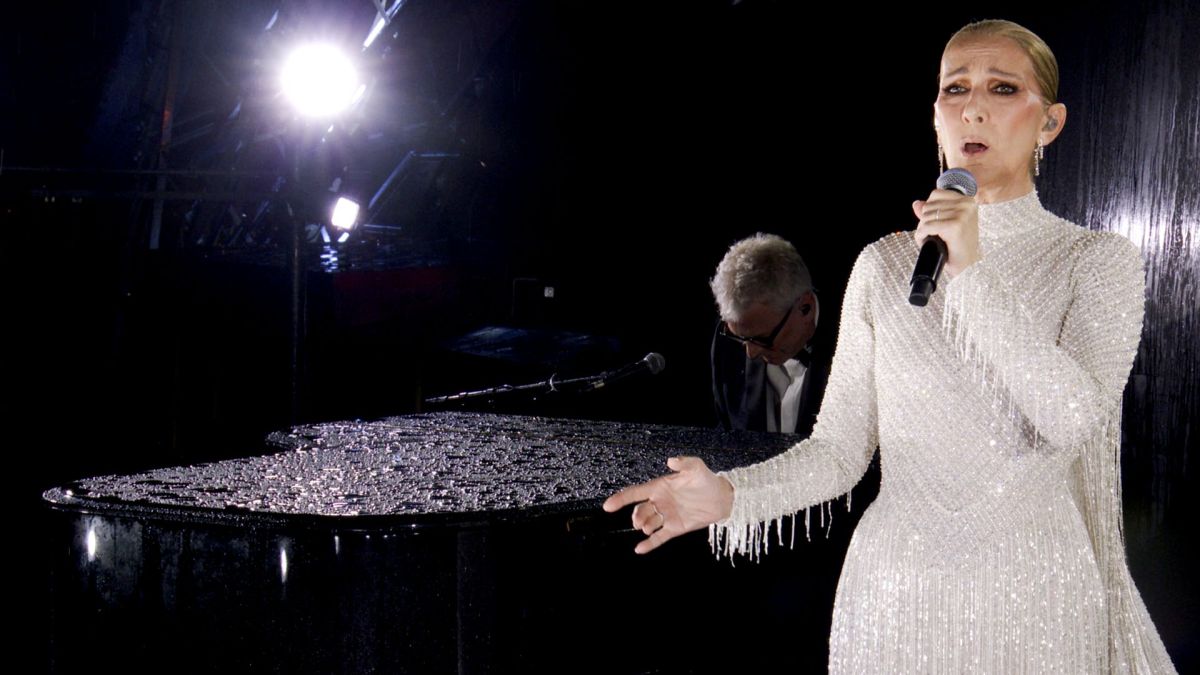 Céline Dion returns to Paris stage with mass karaoke and cheering fans