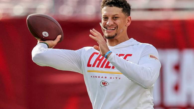 Patrick Mahomes smiling on the field