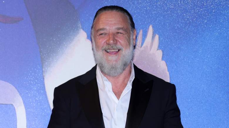 Russell Crowe smiles on the red carpet at the Venice Film Festival